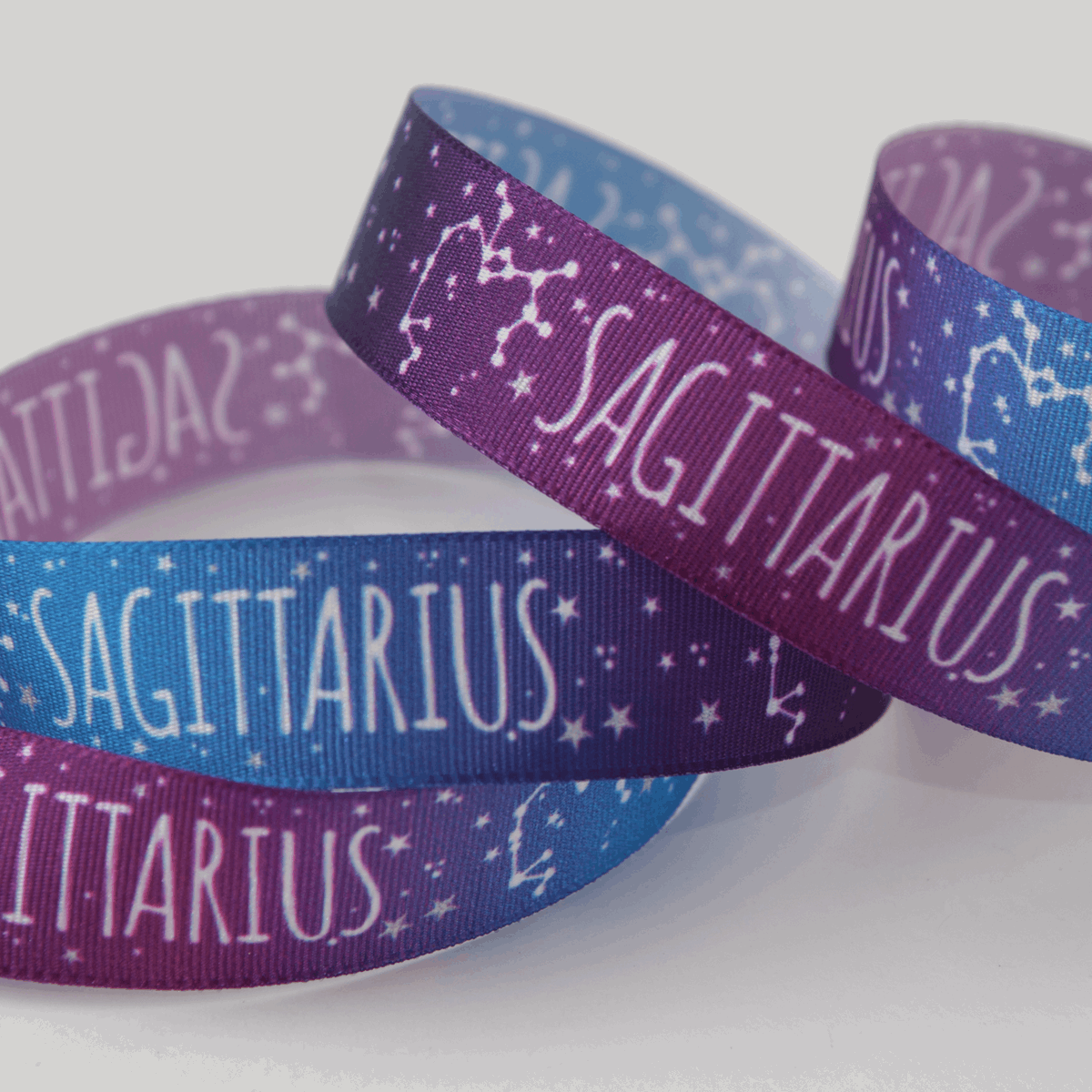 Berisfords Ribbon Zodiac Star Sign Ribbon: Sagittarius: 15mm wide. Price per metre.  - The Sewing Studio